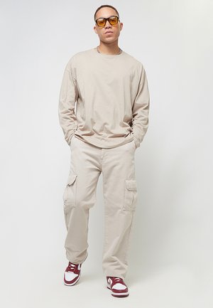 NEIVA  - Reisitaskuhousut - light grey