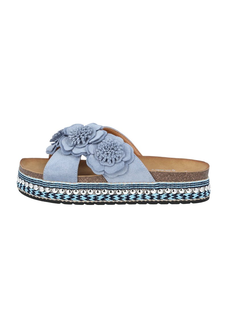 Blue suede slide sandals featuring two floral appliqués, a textured sole, and a decorative woven band with silver accents.