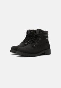 Tamaris Botas para la nieve - black
