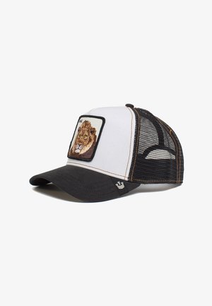 Gorra snapback de malla en blanco y negro con un parche bordado de un león en la parte frontal, con visera curva y acentos de costura marrón.