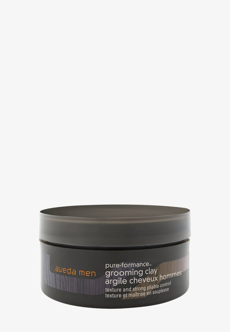 Aveda Men Pflege-Ton in einem schwarzen, runden Behälter mit matter Oberfläche, versehen mit einem mehrfarbigen, horizontalen Streifenetikett und einem Schraubverschluss.