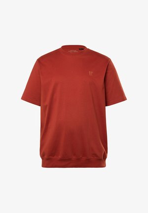 T-shirt z krótkim rękawem, okrągłym dekoltem w kolorze wypalanej pomarańczy, wykonany z bawełny. Posiada subtelne logo w jasnobrązowym kolorze po lewej stronie klatki piersiowej. Gładka struktura.