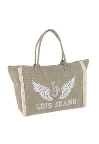 Bolso tote verde de tela con alas blancas impresas y el texto "LOIS JEANS." Presenta bordes deshilachados y dos asas resistentes.