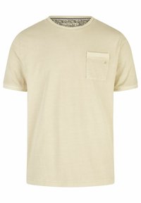 Crème-kleurig kortemouwen t-shirt van zachte katoen, met een voorzak en een ronde hals met een patroonrand aan de binnenkant.