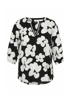 Schwarze Bluse mit großem weißem Blumenmuster, Dreiviertelärmeln und V-Ausschnitt mit gestreiftem Besatz.