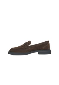 Brown suede loafers with a low block heel, featuring braid detailing on the front and contrasting stitching along the sides.
