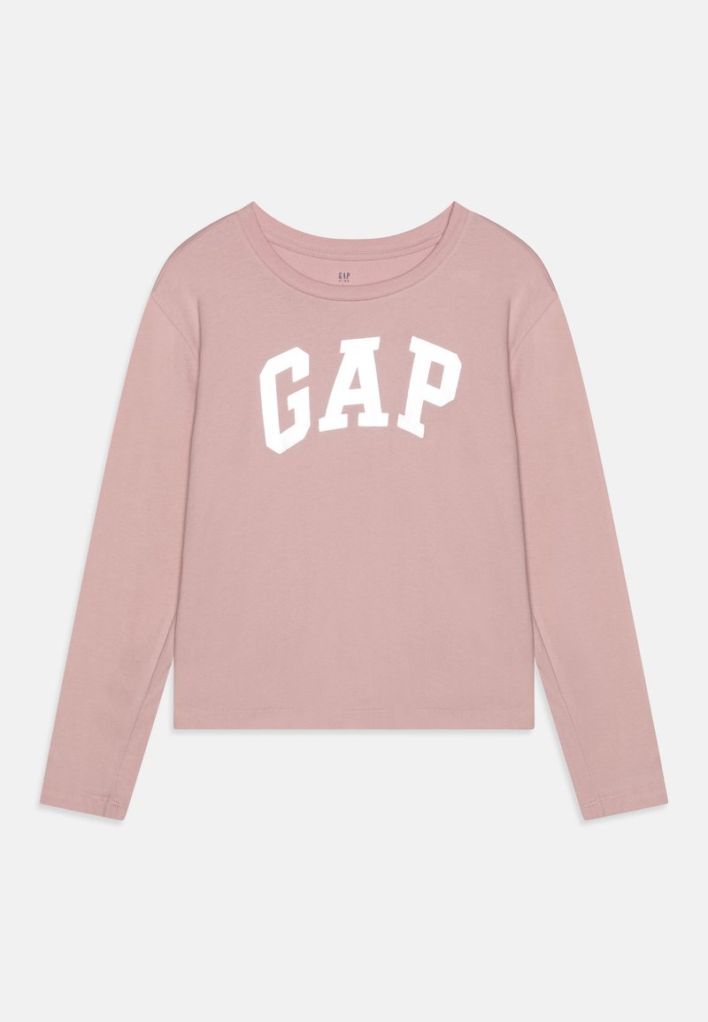 Μακρυμάνικο, κοντό t-shirt σε απαλό ροζ βαμβάκι με στρογγυλή λαιμόκοψη και λευκό γραφικό "GAP" στο στήθος. Λείο υλικό.