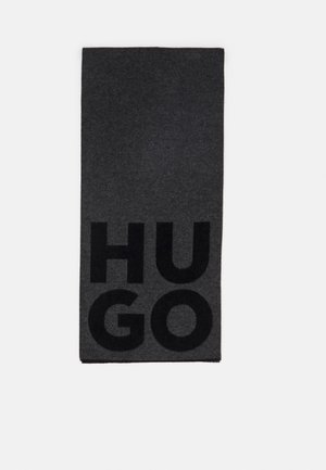 Dark gray rectangular scarf with large black letters spelling "HUGO" vertically on one end.