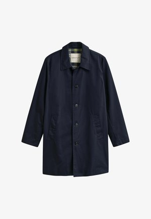 Marineblauer Mantel mit einreihiger Knopfleiste, vier Knöpfen, Seitentaschen, klassischem Kragen und kariertem Innenfutter.