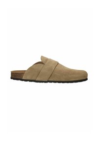 Chaussure slip-on en suède beige avec deux sangles superposées, semelle en liège et semelle en caoutchouc noir, comportant un bout arrondi et une texture lisse.