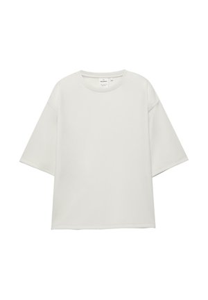 Túlméretezett, egyszínű fehér rövid ujjú póló kerek nyakkivágással és eresztett vállvarrással, fehér háttéren bemutatva.