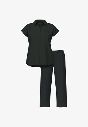 Mustapaita, jossa on lyhyet hihat ja tasku, yhdistettynä vastaaviin mustiin, joustovyötäröisiin väljälahkeisiin housuihin. Sulava kangas, rento istuvuus.