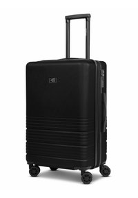 Schwarzer Hartschalenkoffer mit genoppter Oberfläche, ausziehbarem Griff, Reißverschluss und vier drehbaren Rädern für einfache Mobilität.