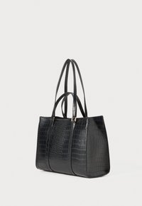 Black crocodile-embossed leather tote bag with double shoulder straps, rectangular shape, smooth texture, and gold-tone hardware accents.
