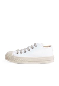 White canvas sneaker with beige accents, round toe, and six eyelets. Features a textured rubber sole and a low-cut design.
