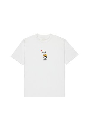 Vit bomull t-shirt med en färgglad tiger grafik med palmer och en röd blomma. Klassisk rund halsringning och korta ärmar.