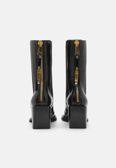 MOSCHINO SCARPONCINO DONNA - Cowboy/Biker boots - nero