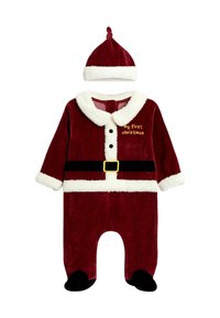 Jumpsuit per neonato in velluto rosso con colletto e polsini in ecopelliccia bianca, cintura nera, fibbia dorata e ricamo "il mio primo Natale". Include cappellino abbinato.