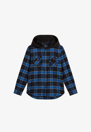 Chemise en flanelle à carreaux noir et bleu avec une capuche noire. Elle possède deux poches poitrine et des boutons sur le devant. Texture douce et coupe décontractée.