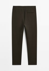 Schwarze Leggings aus glattem, dehnbarem Stoff mit einem elastischen Bund und einer einzelnen Gesäßtasche zur Aufbewahrung.