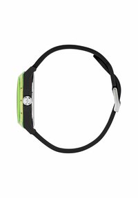 Must mustripaadiga kell, millel on kandiline selge ja roheline kellakuul, millel on julged mustad numbrid ja metallist logo keskel.