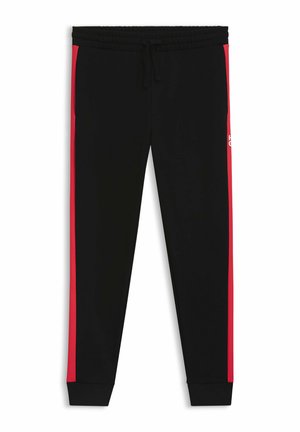 Sorte sweatpants med røde sidelændninger, elastisk talje, snøre og tætsiddende manchetter. Fremstillet af blød, tekstureret stof.