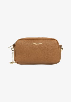Brown textured leather crossbody bag with a gold logo, zip closure, and chain strap. Compact rectangular shape with rounded edges.