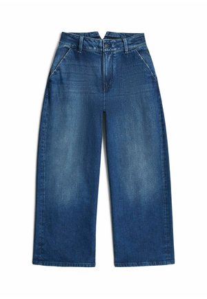 Weit geschnittene blaue Denim-Jeans mit hoher Taille, vorderem Knopf und Reißverschluss sowie seitlichen Taschen, flach auf weißem Hintergrund liegend.