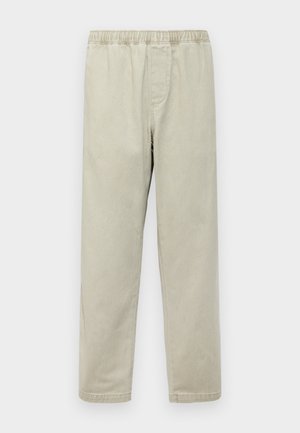 Hellbeige Stretchhosen mit einem elastischen Bund, geraden Beinen, seitlichen Taschen und einer weichen, glatten Stoffoberfläche.