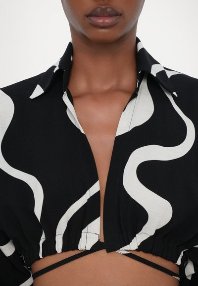 Undress Code Bluse - black