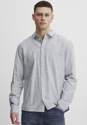 Light gray, striped long-sleeve shirt in a cotton blend, featuring a button-down collar and a chest pocket. Casual fit with button closure.