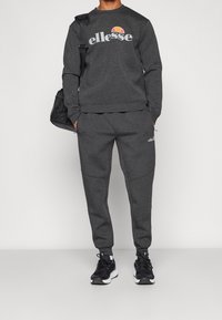 Ellesse Jogginghose - mottled black