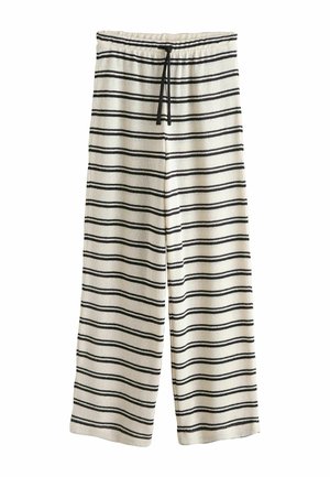 Weiße Strick-Loungehose mit schwarzen horizontalen Streifen und einem schwarzen Taillenband mit Kordelzug, weit geschnitten und mit lockerem Sitz.