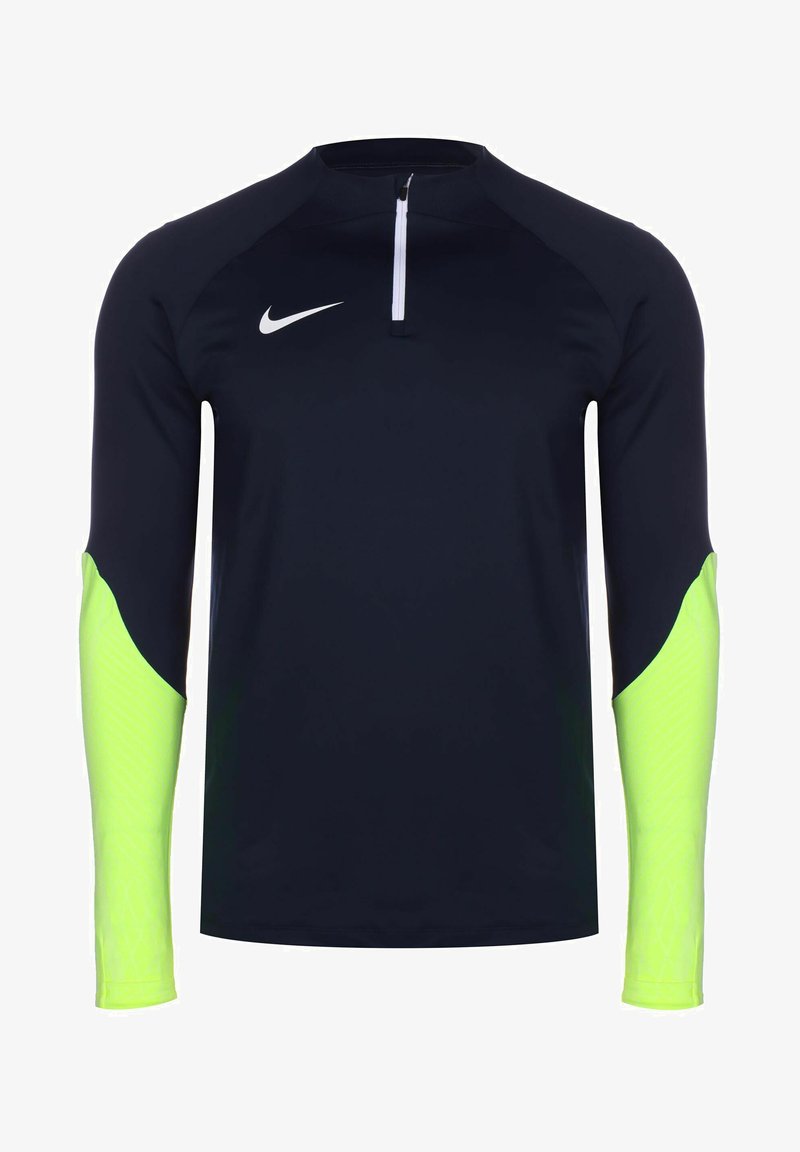 T-shirt de sport à manches longues navy avec col zippé demi, présentant des manches texturées vert fluo et un logo blanc contrastant sur la poitrine.