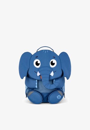 Blue children's backpack designed as a smiling elephant with large ears, a trunk, two tusks, big eyes, and front zipper pockets shaped like feet.