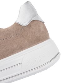 Beige suede sneaker heel with white padded collar and thick white rubber sole featuring textured grip and silver strip accent.
