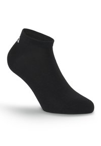 Chaussette noire à la cheville avec un bord côtelé et un petit logo blanc près du talon, affichée sur un fond blanc.
