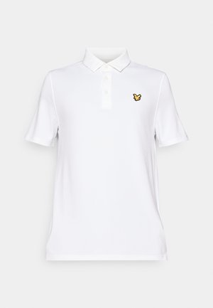 Polo bianco con colletto, tre bottoni e maniche corte. Presenta un piccolo logo ricamato giallo sul lato sinistro del petto.