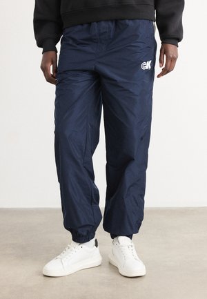 Calvin Klein Jeans PULL ON LOGO JOGGER  - Tracksuit bottoms - dark sapphire