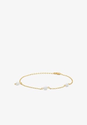 Bracelet chaîne en or avec trois perles blanches, doté d'un fermoir simple. La chaîne présente un design délicat à maillons entrelacés et une texture lisse.