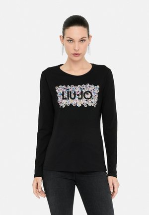 T-shirt nero a maniche lunghe con design floreale e testo "LIU JO" in paillettes colorate sul davanti, con collo rotondo.