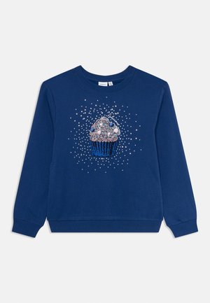 Marineblaue Sweatshirt aus Baumwolle mit einem Cupcake-Motiv, das mit Glitzer und bunten Akzenten verziert ist. Es hat einen runden Halsausschnitt und lange Ärmel.