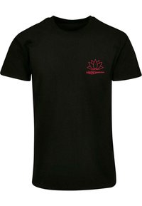 Sort bomulds T-shirt med korte ærmer, med et rødt lotus-logo og teksten "DIE FLIPPERS" på den øverste venstre side.