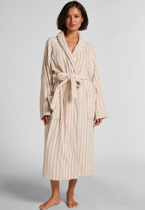 Beige striped bathrobe with a shawl collar, tie belt, and two front pockets. Fabric appears textured and soft. Long sleeves and knee-length design.