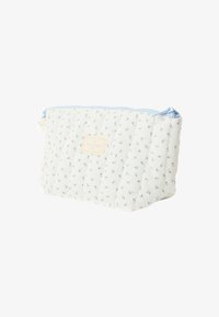Vadderad vit påse med blå detaljer, med ett blommönster och dragkedjestängning. Liten rektangulär form med ett tygmärke.
