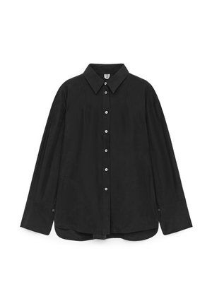 Black button-up shirt made of smooth fabric, featuring a collar, long sleeves, and a slightly curved hem with button accents.
