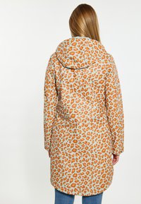 Schmuddelwedda Parka - pastellmint orange leo