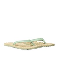 Pair of beige flip-flops with light green straps and textured wavy soles, positioned side by side on a white background.