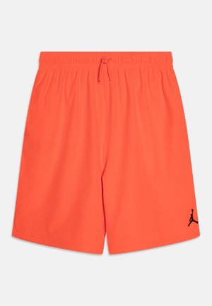 Bright orange athletic shorts with an elastic waistband and drawstring. Features a black Jordan logo on the lower left side.