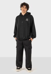 Kaotiko SUD CAP URBAN EYE - Felpa - black
